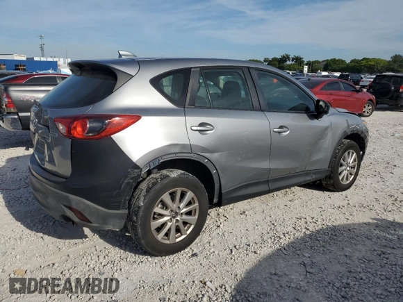 2015 Mazda CX-5 Sport with VIN JM3KE2BE2F0445810, listed as a Copart auction lot 65672555 with 218,675 mi miles and Clean title. Bid and sale history available at DreamBid. Image 3.