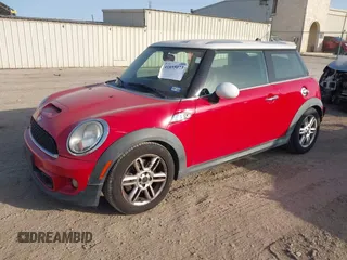 2013 MINI Hardtop S with VIN WMWSV3C56DT392499, listed as a IAAI auction lot 41855073 with 55,403 mi miles and . Bid and sale history available at DreamBid. Image 2.