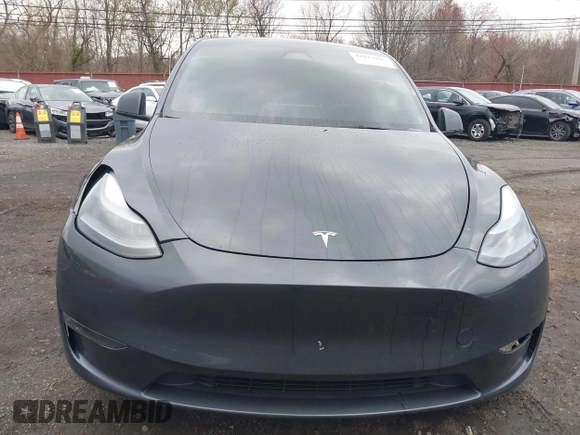 2024 Tesla Model Y Long Range z VIN 7SAYGDEE1RA323921, wystawiony jako IAAI lot #42027195 z przebiegiem 13 774 mil mil oraz . Historia ofert i sprzedaży dostępna na DreamBid. Obrazek 20.