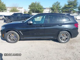 2020 BMW X3 M40i with VIN 5UXTY9C04LL304634, listed as a IAAI auction lot 41821262 with 71,731 mi miles and . Bid and sale history available at DreamBid. Image 14.