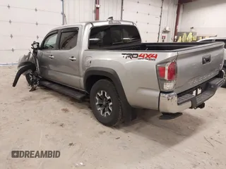 2023 Toyota Tacoma SR z VIN 3TMCZ5AN4PM597509, wystawiony jako IAAI lot #42020023 z przebiegiem 36 941 mil mil oraz . Historia ofert i sprzedaży dostępna na DreamBid. Obrazek 3.