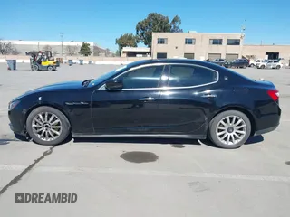 2014 Maserati Ghibli z VIN ZAM57XSA5E1091490, wystawiony jako IAAI lot #41848480 z przebiegiem 129 585 mil mil oraz . Historia ofert i sprzedaży dostępna na DreamBid. Obrazek 14.