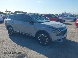2023 Kia Sportage SX-Prestige z VIN 5XYK53AF9PG134654, wystawiony jako IAAI lot #41702727 z przebiegiem 21 624 mil mil oraz . Historia ofert i sprzedaży dostępna na DreamBid. Obrazek 1.