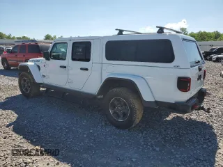 2023 Jeep Gladiator Rubicon with VIN 1C6JJTBG9PL546437, listed as a Copart auction lot 55516685 with 14,106 mi miles and Salvage title. Bid and sale history available at DreamBid. Image 2.