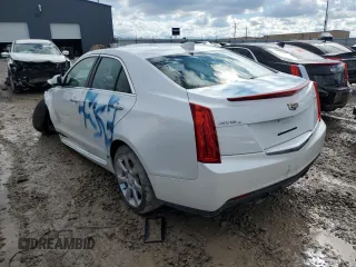2016 Cadillac ATS Standard AWD z VIN 1G6AG5RX1G0157420, wystawiony jako Copart lot #70697003 z przebiegiem Nie podano mil oraz Szkoda całkowita • Salvage title. Historia ofert i sprzedaży dostępna na DreamBid. Obrazek 2.