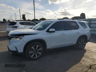 2024 Honda Pilot Touring z VIN 5FNYG2H76RB008887, wystawiony jako Copart lot #51457685 z przebiegiem 12 947 mil mil oraz Szkoda całkowita • Salvage title. Historia ofert i sprzedaży dostępna na DreamBid. Obrazek 1.