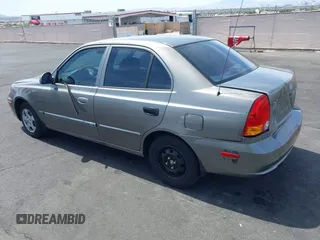 2003 Hyundai Accent GL with VIN KMHCG45C73U471607, listed as a IAAI auction lot 41956551 with 222,305 mi miles. Bid and sale history available at carsss.com. Image 3.