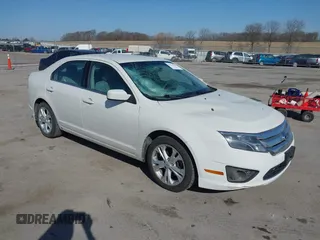 2012 Ford Fusion SE z VIN 3FAHP0HA4CR387836, wystawiony jako IAAI lot #41914428 z przebiegiem 126 768 mil mil oraz . Historia ofert i sprzedaży dostępna na DreamBid. Obrazek 1.