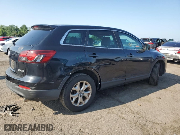 2014 Mazda CX-9 Sport with VIN JM3TB2BV6E0431971, listed as a Copart auction lot 63778635 with 136,287 mi miles and Salvage title. Bid and sale history available at DreamBid. Image 3.