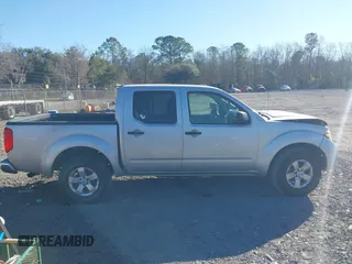 2013 Nissan Frontier SV with VIN 1N6AD0EV6DN720356, listed as a IAAI auction lot 41694570 with 243,279 mi miles and . Bid and sale history available at DreamBid. Image 13.