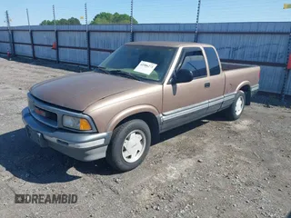 1996 GMC Sonoma SLS w/1SG Pkg with VIN 1GTCS19W3T8529954, listed as a IAAI auction lot 41986273 with 202,669 mi miles. Bid and sale history available at carsss.com. Image 2.