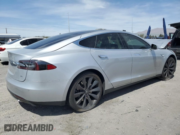 2014 Tesla Model S 60 with VIN 5YJSA1H11EFP49407, listed as a Copart auction lot 52215955 with 109,827 mi miles and Salvage Title. Bid and sale history available at DreamBid. Image 3.