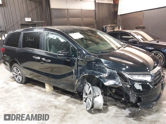 2021 Honda Odyssey Touring with VIN 5FNRL6H83MB040138, listed as a IAAI auction lot 39150096 with 61,322 mi miles and . Bid and sale history available at DreamBid. Image 6.