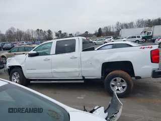 2018 Chevrolet Silverado 1500 LT with VIN 1GCUKREC0JF208509, listed as a IAAI auction lot 41794616 with 96,962 mi miles and . Bid and sale history available at DreamBid. Image 15.