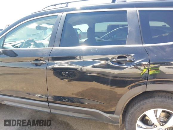 2019 Subaru Ascent Premium with VIN 4S4WMAFD7K3404604, listed as a IAAI auction lot 42078830 with 99,373 mi miles and . Bid and sale history available at DreamBid. Image 14.