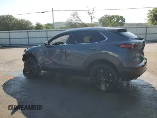 2023 Mazda CX-30 S Carbon Edition with VIN 3MVDMBCM1PM553374, listed as a Copart auction lot 62080975 with 51,527 mi miles and Salvage title. Bid and sale history available at DreamBid. Image 2.