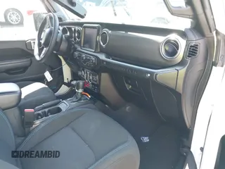 2023 Jeep Wrangler Rubicon with VIN 1C4JJXR68PW584303, listed as a IAAI auction lot 42049098 with 29,565 mi miles and . Bid and sale history available at DreamBid. Image 5.