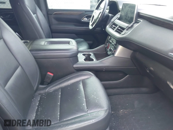 2021 Chevrolet Tahoe Z71 with VIN 1GNSKPKD8MR122190, listed as a IAAI auction lot 41587419 with 106,828 mi miles and . Bid and sale history available at DreamBid. Image 5.