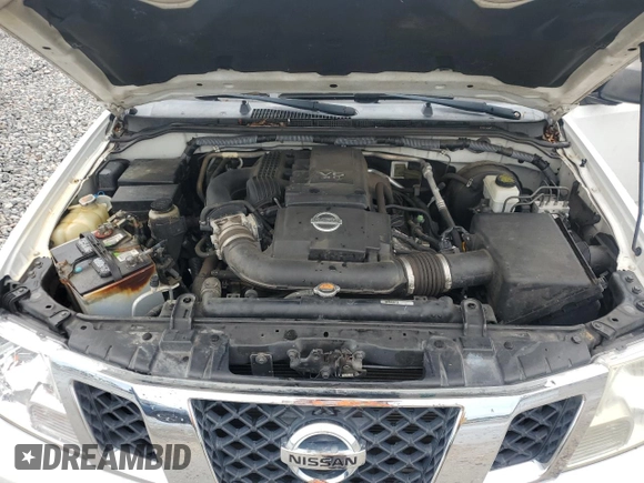 2012 Nissan Frontier SV with VIN 1N6AD0ER5CC465194, listed as a Copart auction lot 64802135 with 101,005 mi miles and Salvage title. Bid and sale history available at DreamBid. Image 11.
