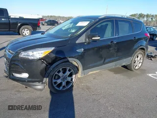 2016 Ford Escape Titanium with VIN 1FMCU0JX3GUA90420, listed as a IAAI auction lot 41850537 with 115,770 mi miles. Bid and sale history available at carsss.com. Image 20.