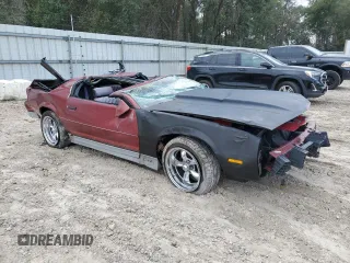 1987 Chevrolet Camaro z VIN 1G1FP21H2HN131699, wystawiony jako Copart lot #87860445 z przebiegiem 86 117 mil mil oraz Szkoda całkowita • Salvage title. Historia ofert i sprzedaży dostępna na DreamBid. Obrazek 4.