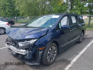 2022 Honda Odyssey EX-L with VIN 5FNRL6H70NB053843, listed as a IAAI auction lot 40210685 with 21,571 mi miles and . Bid and sale history available at DreamBid. Image 18.
