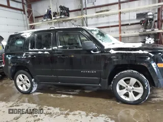 2014 Jeep Patriot Limited with VIN 1C4NJRCB8ED910340, listed as a IAAI auction lot 41396065 with 241,669 mi miles. Bid and sale history available at carsss.com. Image 13.