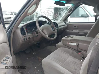 2000 Toyota Tundra SR5 with VIN 5TBRT3414YS086059, listed as a IAAI auction lot 41609962 with 105,030 mi miles and . Bid and sale history available at DreamBid. Image 5.