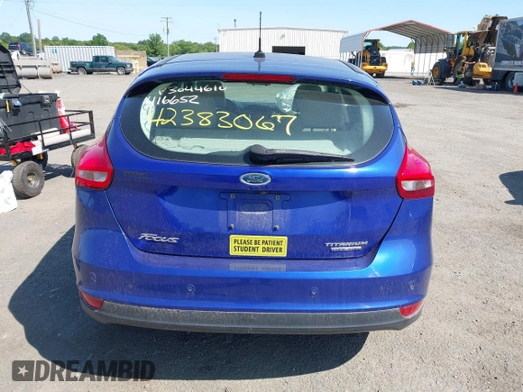 2015 Ford Focus Titanium z VIN 1FADP3N25FL291844, wystawiony jako IAAI lot #42383067 z przebiegiem 82 545 mil mil oraz . Historia ofert i sprzedaży dostępna na DreamBid. Obrazek 16.