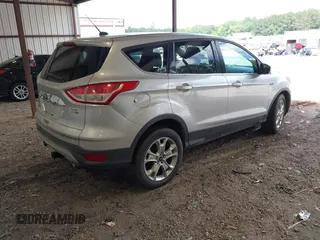 2013 Ford Escape SEL z VIN 1FMCU9HX0DUB99150, wystawiony jako IAAI lot #42812971 z przebiegiem 212 298 mil mil oraz . Historia ofert i sprzedaży dostępna na DreamBid. Obrazek 4.