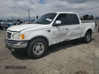 2002 Ford F-150 XLT with VIN 1FTRW07L52KA04929, listed as a Copart auction lot 54491815 with 169,132 mi miles and Salvage Title. Bid and sale history available at carsss.com. Image 1.