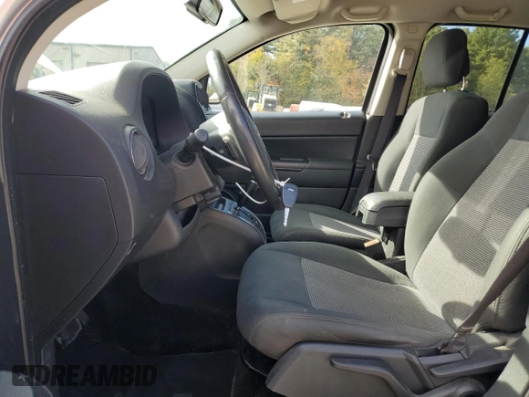 2013 Jeep Compass High Altitude with VIN 1C4NJCEA6DD208419, listed as a Copart auction lot 76323074 with 183,575 mi miles and Clean Title. Bid and sale history available at carsss.com. Image 7.