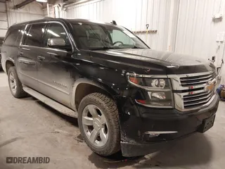2017 Chevrolet Suburban Premier with VIN 1GNSKJKC0HR250854, listed as a IAAI auction lot 41541476 with 128,231 mi miles. Bid and sale history available at carsss.com. Image 1.