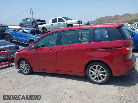 2015 Mazda 5 Grand Touring with VIN JM1CW2DL6F0190312, listed as a IAAI auction lot 42433782 with 79,140 mi miles and . Bid and sale history available at DreamBid. Image 14.