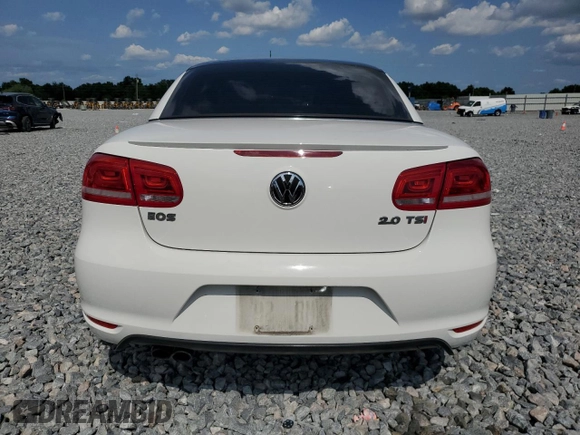 2013 Volkswagen Eos Sport с VIN WVWBW8AH8DV001948, выставлен на аукционе Copart как лот 56292615 с пробегом 75 398 миль миль и На запчасти • Non repairable. История ставок и продаж доступна на DreamBid. Изображение 6.