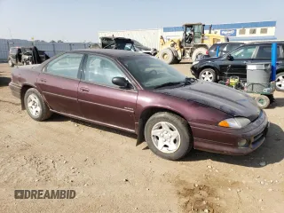 1996 Dodge Intrepid with VIN 2B3HD46F3TH302197, listed as a Copart auction lot 71021014 with 182,333 mi miles and Salvage Title. Bid and sale history available at carsss.com. Image 4.