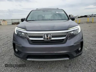 2020 Honda Pilot EX z VIN 5FNYF6H35LB011844, wystawiony jako Copart lot #50884925 z przebiegiem 62 852 mil mil oraz Szkoda całkowita • Salvage title. Historia ofert i sprzedaży dostępna na DreamBid. Obrazek 5.
