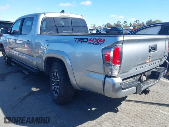 2022 Toyota Tacoma SR5 with VIN 3TMDZ5BN6NM122590, listed as a IAAI auction lot 41714578 with 56,472 mi miles and . Bid and sale history available at DreamBid. Image 3.