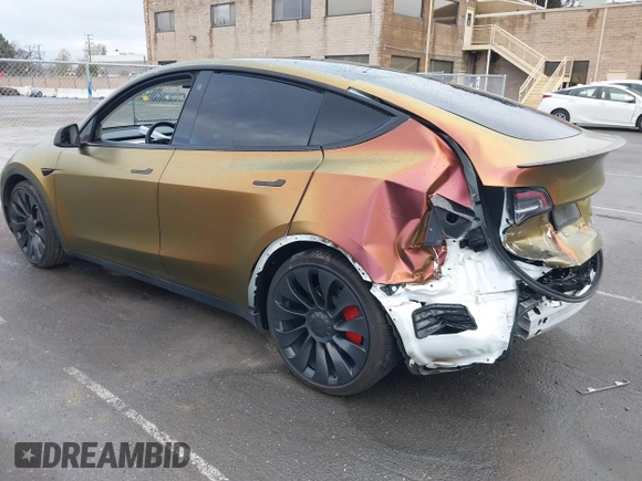 2023 Tesla Model Y Performance with VIN 7SAYGDEF4PF738885, listed as a IAAI auction lot 41798997 with 59,270 mi miles and . Bid and sale history available at DreamBid. Image 3.