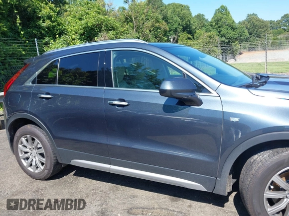 2019 Cadillac XT4 AWD Premium Luxury with VIN 1GYFZDR40KF129461, listed as a IAAI auction lot 42531671 with 60,731 mi miles and . Bid and sale history available at DreamBid. Image 13.