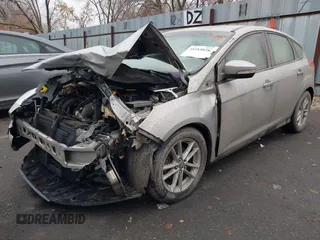 2015 Ford Focus SE with VIN 1FADP3K2XFL376683, listed as a IAAI auction lot 41189828 with 175,151 mi miles. Bid and sale history available at carsss.com. Image 2.
