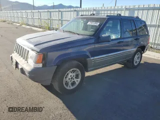 1997 Jeep Grand Cherokee Limited with VIN 1J4GZ78Y8VC737860, listed as a Copart auction lot 72981354 with 292,652 mi miles and Salvage Title. Bid and sale history available at carsss.com. Image 1.