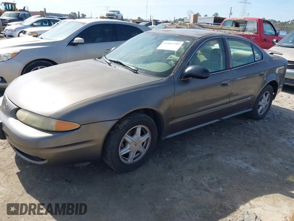 2002 Oldsmobile Alero GL1 z VIN 1G3NL52E82C172314, wystawiony jako IAAI lot #41465789 z przebiegiem 118 427 mil mil oraz . Historia ofert i sprzedaży dostępna na DreamBid. Obrazek 2.