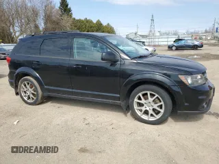 2015 Dodge Journey R/T with VIN 3C4PDDEG8FT557962, listed as a Copart auction lot 51987145 with 141,898 mi miles and Clean Title. Bid and sale history available at DreamBid. Image 4.