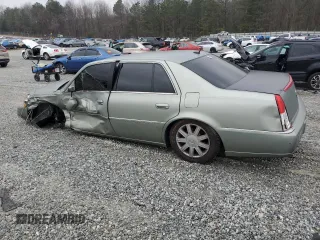 2006 Cadillac DTS 1SD z VIN 1G6KD57YX6U193025, wystawiony jako Copart lot #45784605 z przebiegiem Nie podano mil oraz Szkody całkowita. Historia ofert i sprzedaży dostępna na DreamBid. Obrazek 2.