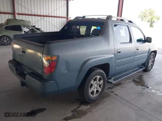 2006 Honda Ridgeline RTL with VIN 2HJYK16516H511027, listed as a IAAI auction lot 42052394 with 354,106 mi miles. Bid and sale history available at carsss.com. Image 4.