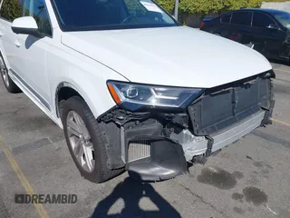 2021 Audi Q7 Premium Plus with VIN WA1LXAF73MD021033, listed as a IAAI auction lot 41814415 with 64,377 mi miles and . Bid and sale history available at DreamBid. Image 6.
