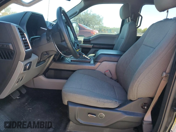2015 Ford F-150 XLT with VIN 1FTEW1C81FFB01582, listed as a Copart auction lot 50217985 with 178,775 mi miles and Salvage Title. Bid and sale history available at carsss.com. Image 7.