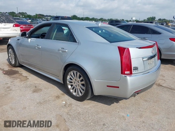 2012 Cadillac CTS Performance z VIN 1G6DJ5E37C0145221, wystawiony jako IAAI lot #42111935 z przebiegiem 82 103 mil mil oraz . Historia ofert i sprzedaży dostępna na DreamBid. Obrazek 3.
