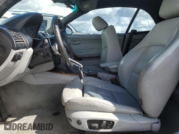 2008 BMW 1 Series 128i with VIN WBAUL73578VE88077, listed as a Copart auction lot 48655115 with 142,931 mi miles and Salvage title. Bid and sale history available at DreamBid. Image 7.